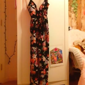 Girls flower romper. Size 10-12. Never worn.